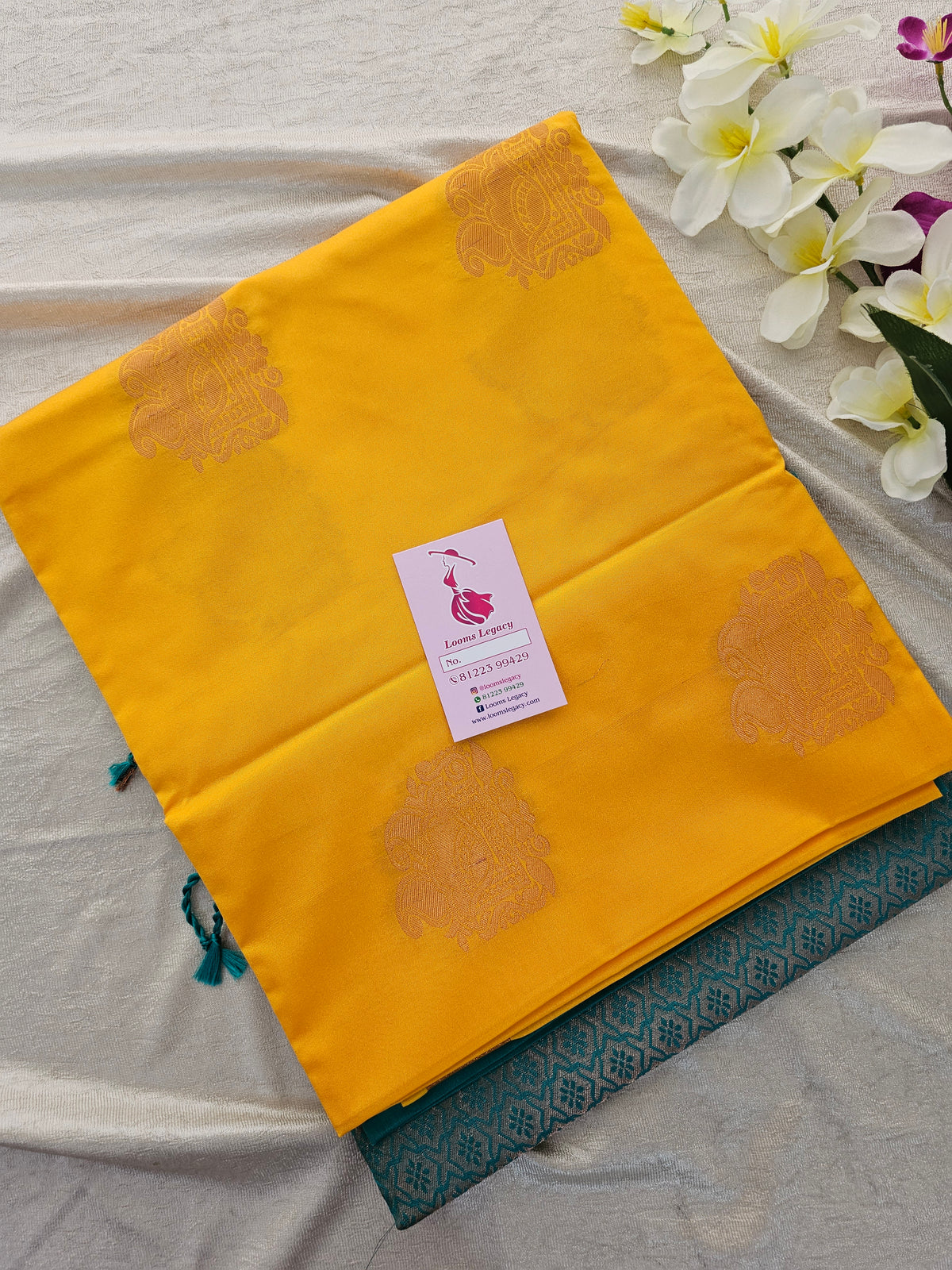 Yellow with Sea Green Copper Zari Woven Border Semi Soft Silk Saree