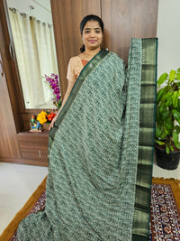 Semi Tussar Georgette with Zari Woven Saree Border - Dark Green