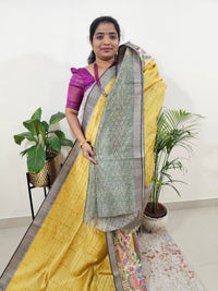 Soft Semi Tussar Weaving with Kalamkari Border -   Yellow with Grey