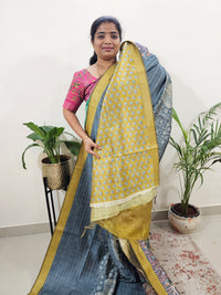 Soft Semi Tussar Weaving with Pichwai Border - Grey with Yellow