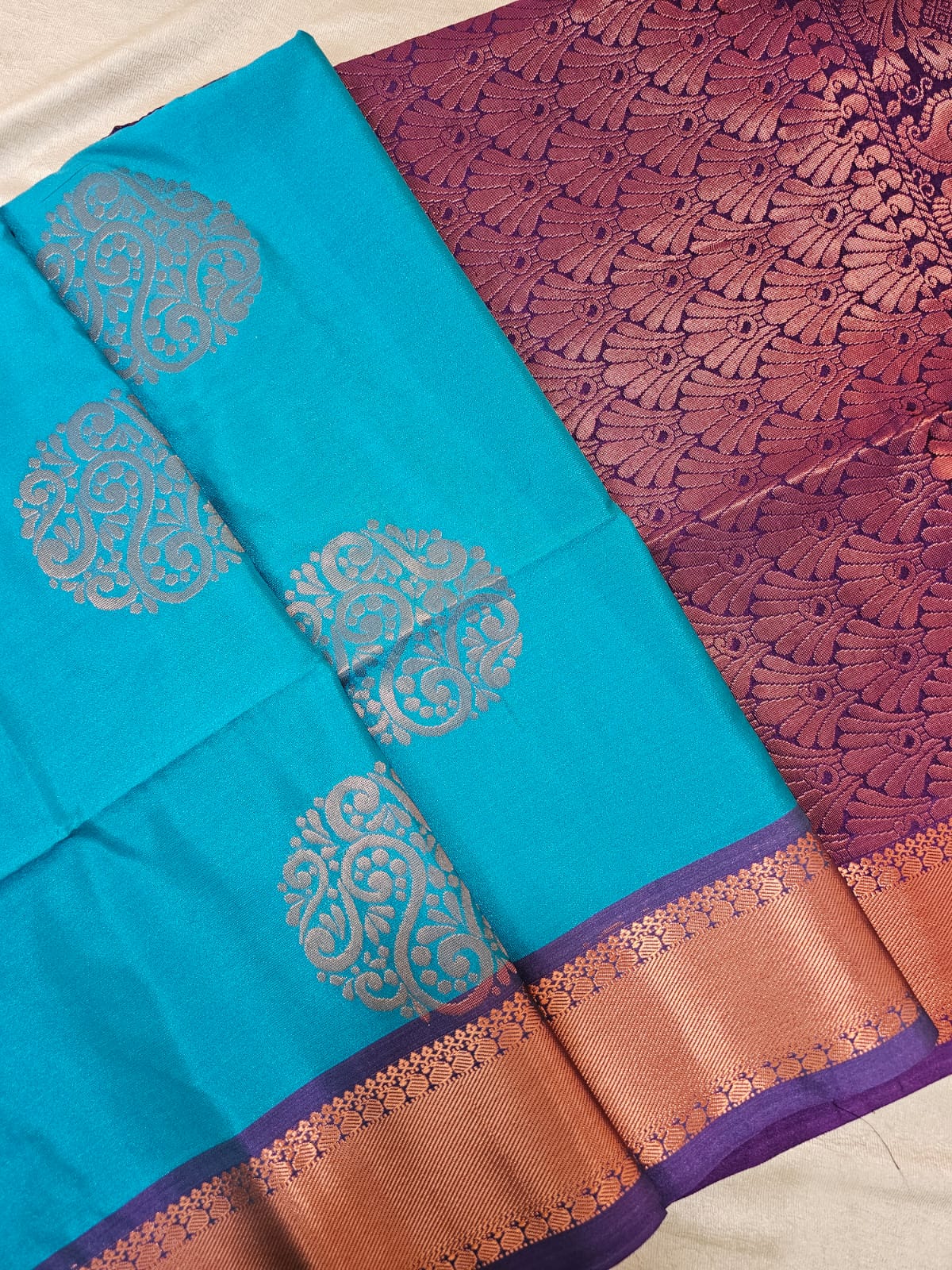 Blue with Purple Copper Zari Woven Border Semi Soft Silk Saree