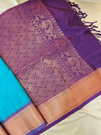 Blue with Purple Copper Zari Woven Border Semi Soft Silk Saree