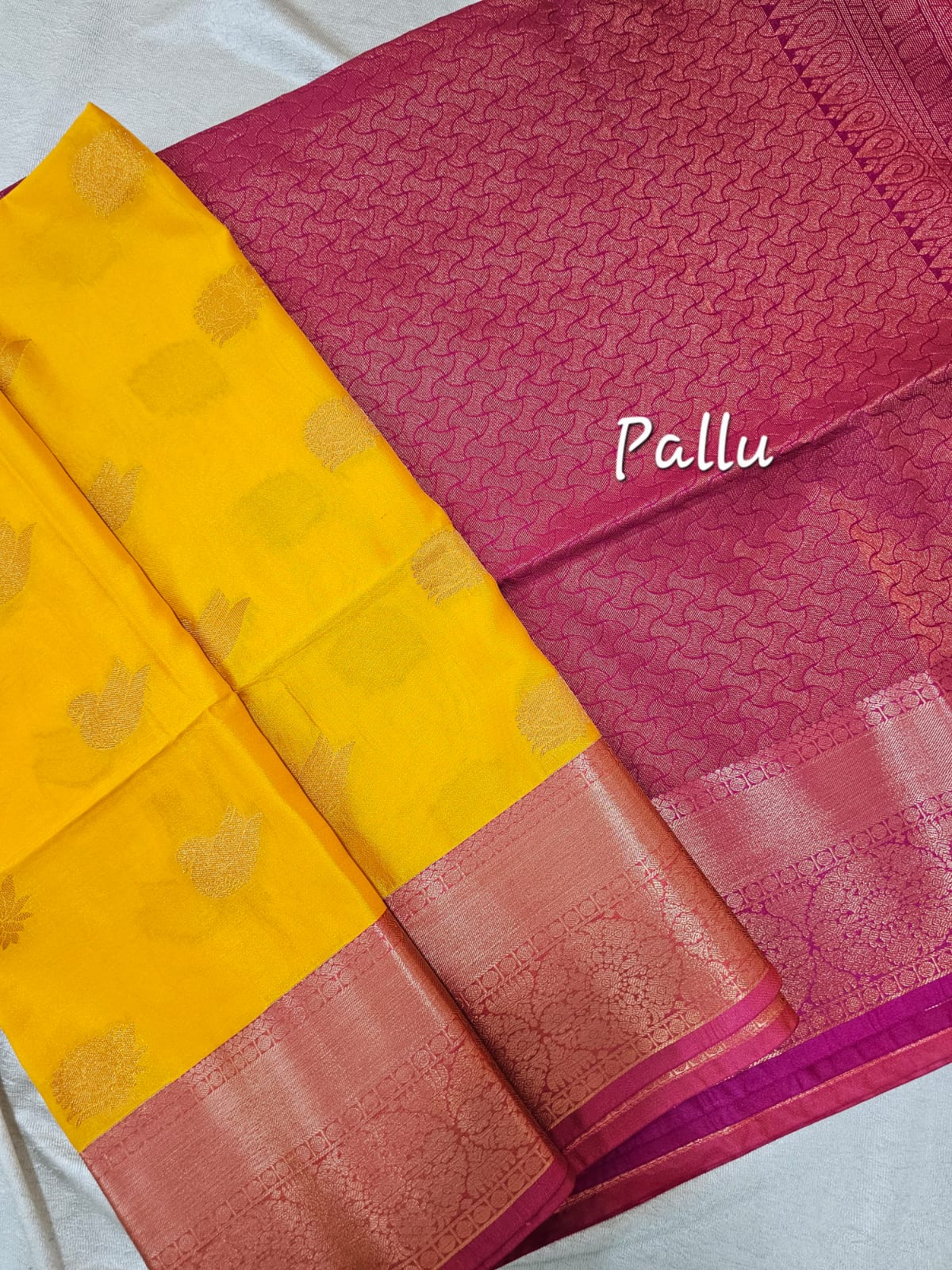 Yellow with Pink Copper Zari Woven Border Semi Soft Silk Saree