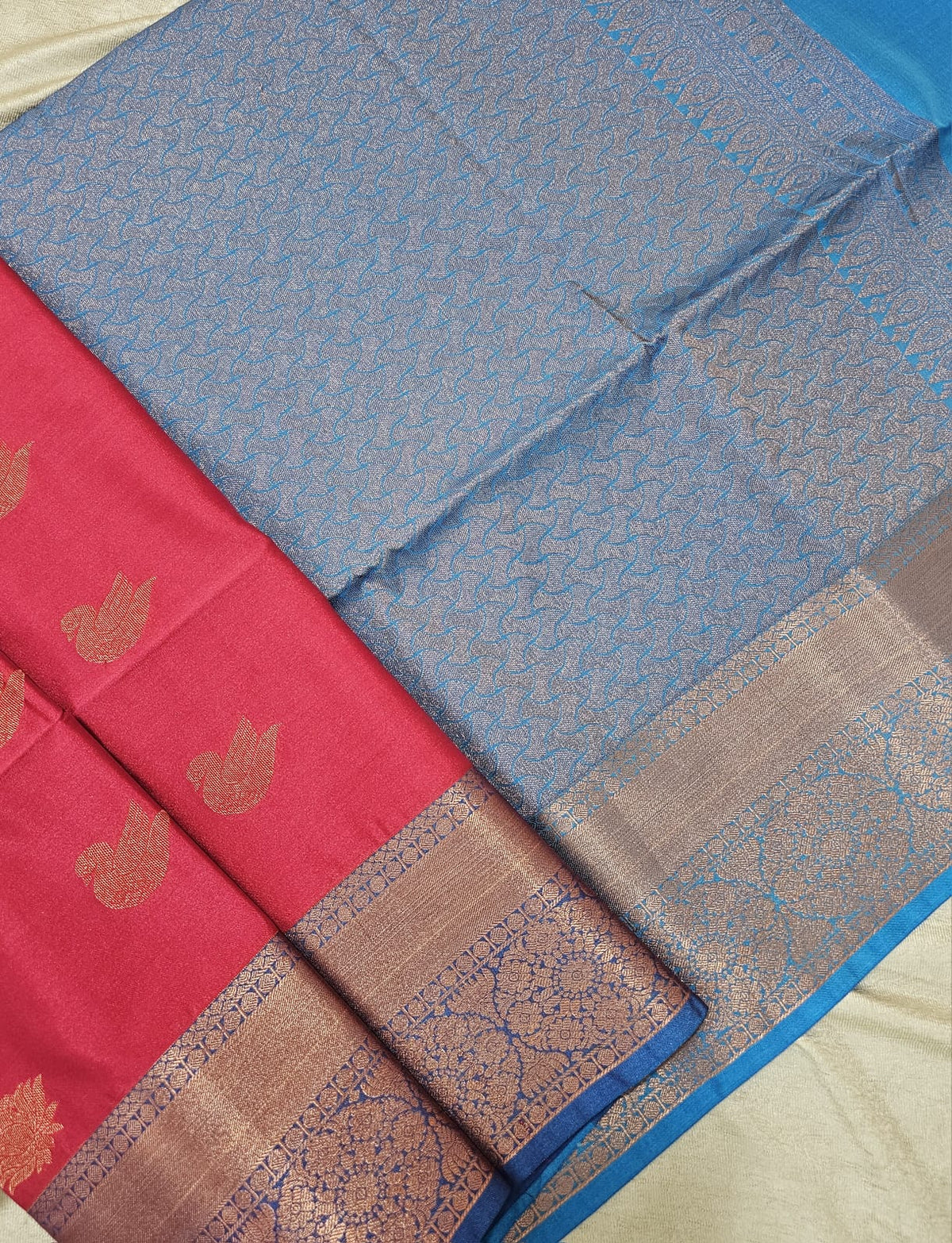 Pink with Blue Copper Zari Woven Border Semi Soft Silk Saree