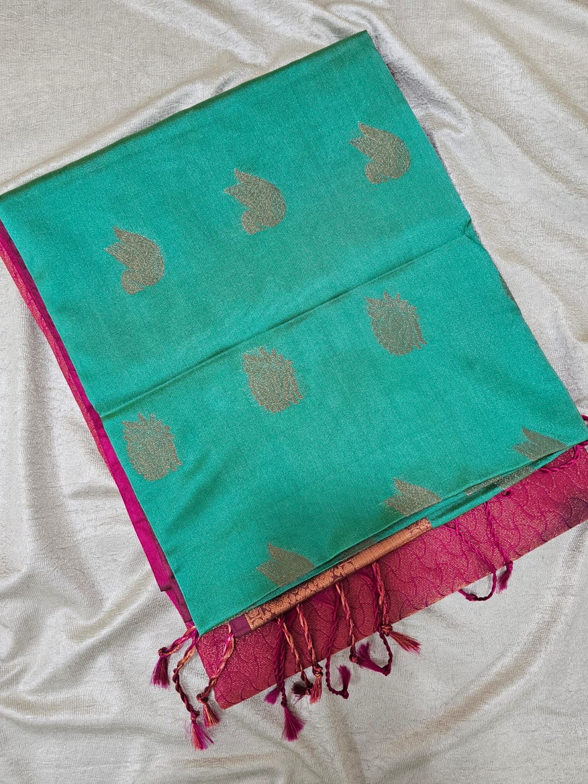 Green with Pink Copper Zari Woven Border Semi Soft Silk Saree