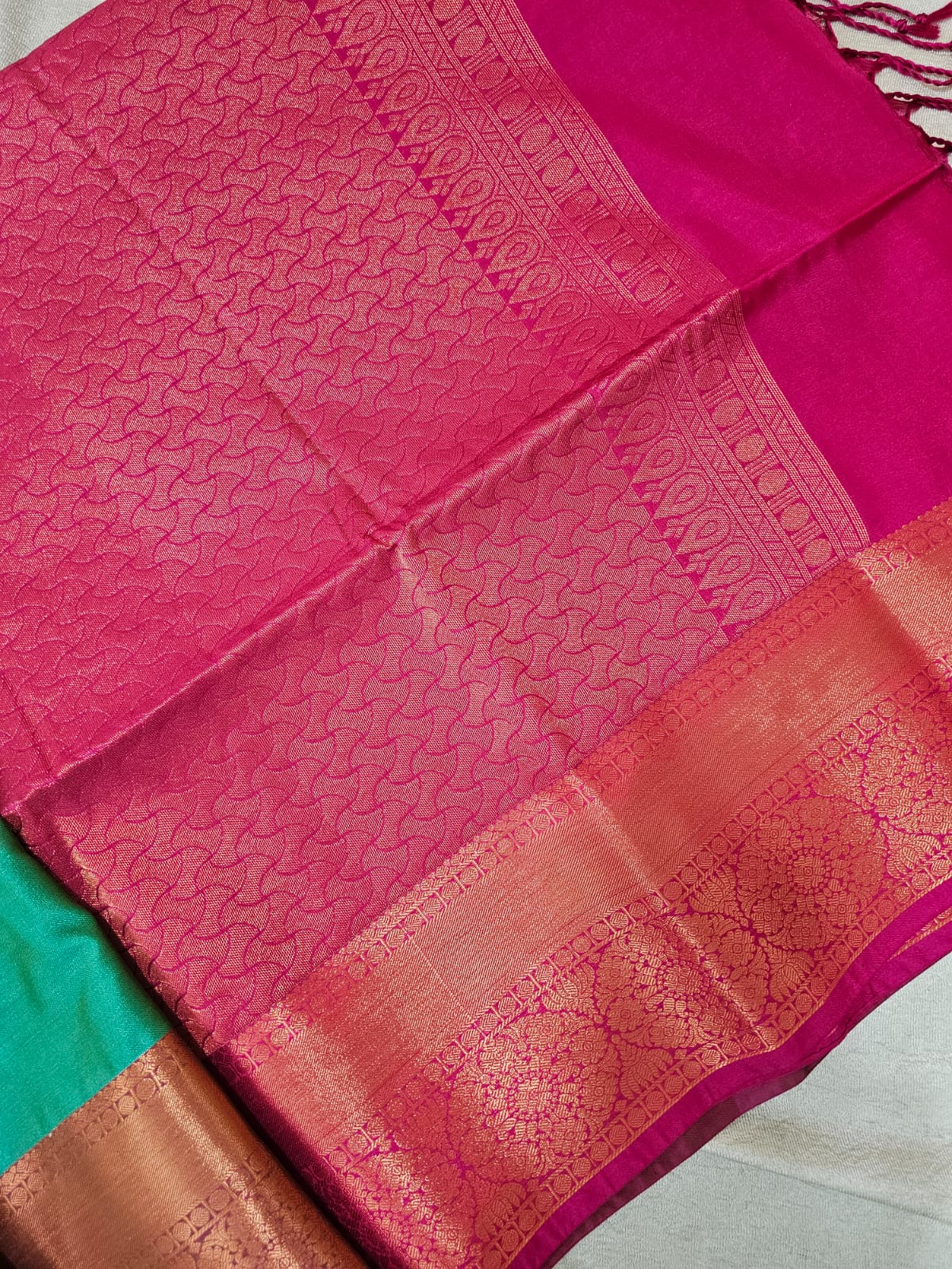 Green with Pink Copper Zari Woven Border Semi Soft Silk Saree