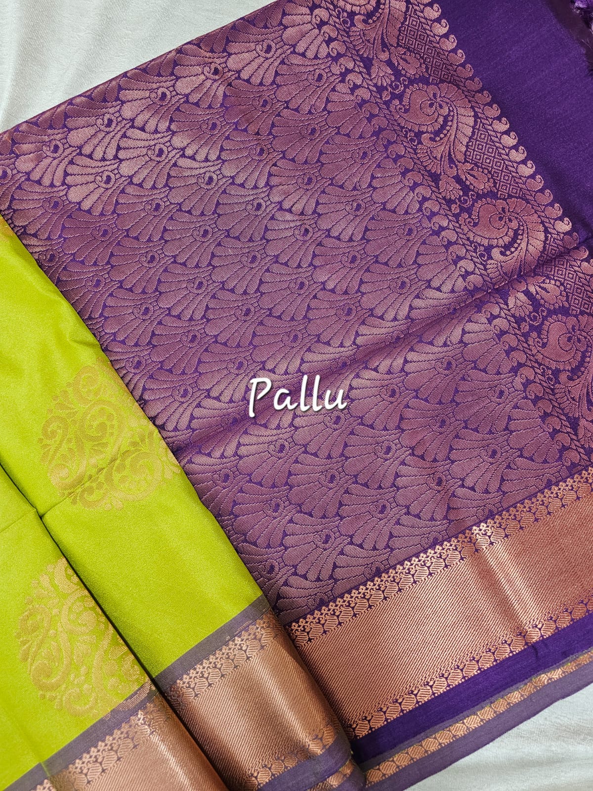 Green with Purple Copper Zari Woven Border Semi Soft Silk Saree