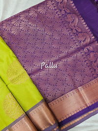 Green with Purple Copper Zari Woven Border Semi Soft Silk Saree