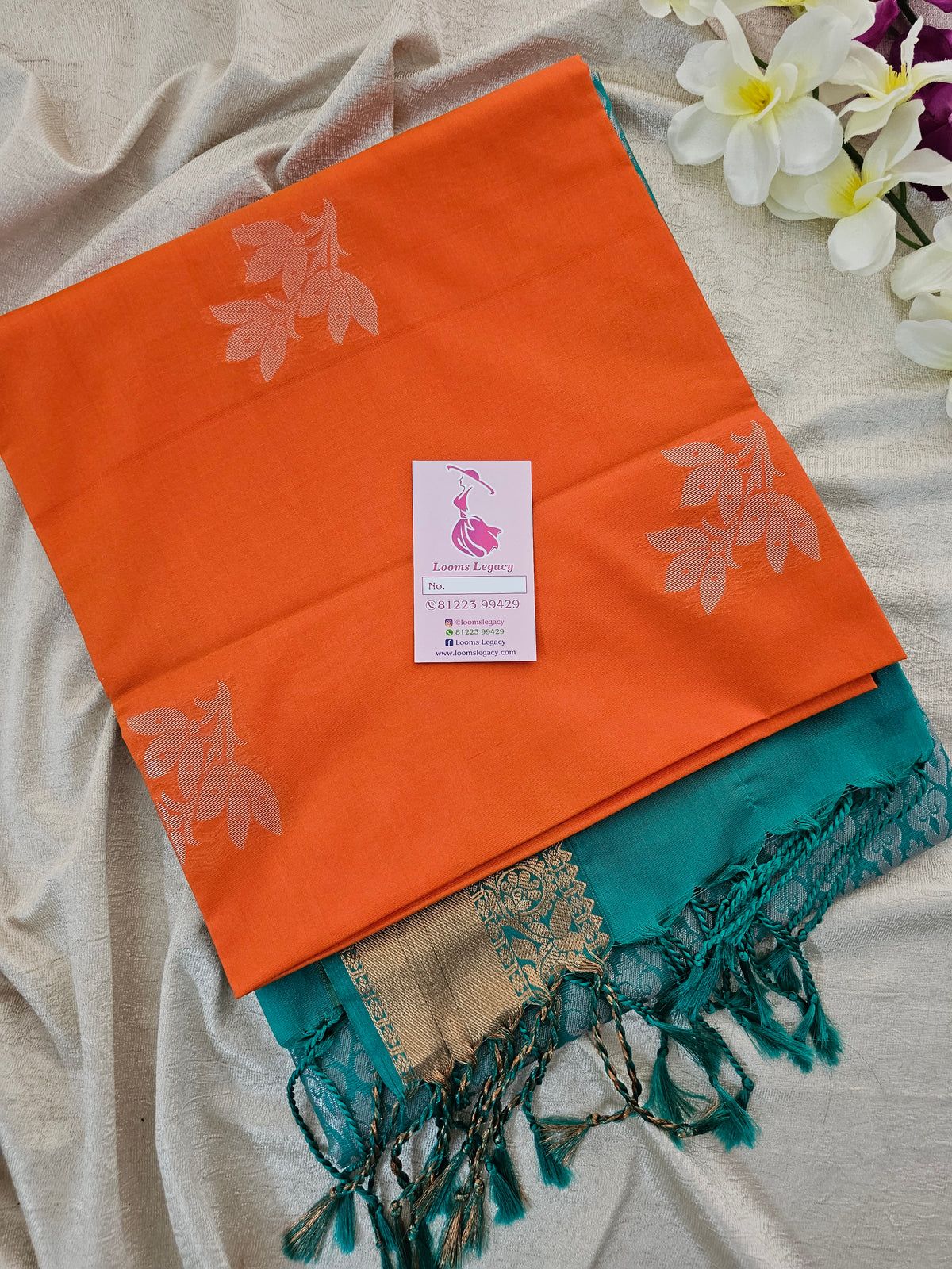 Orange with Sea Green Copper Zari Woven Border Semi Soft Silk Saree