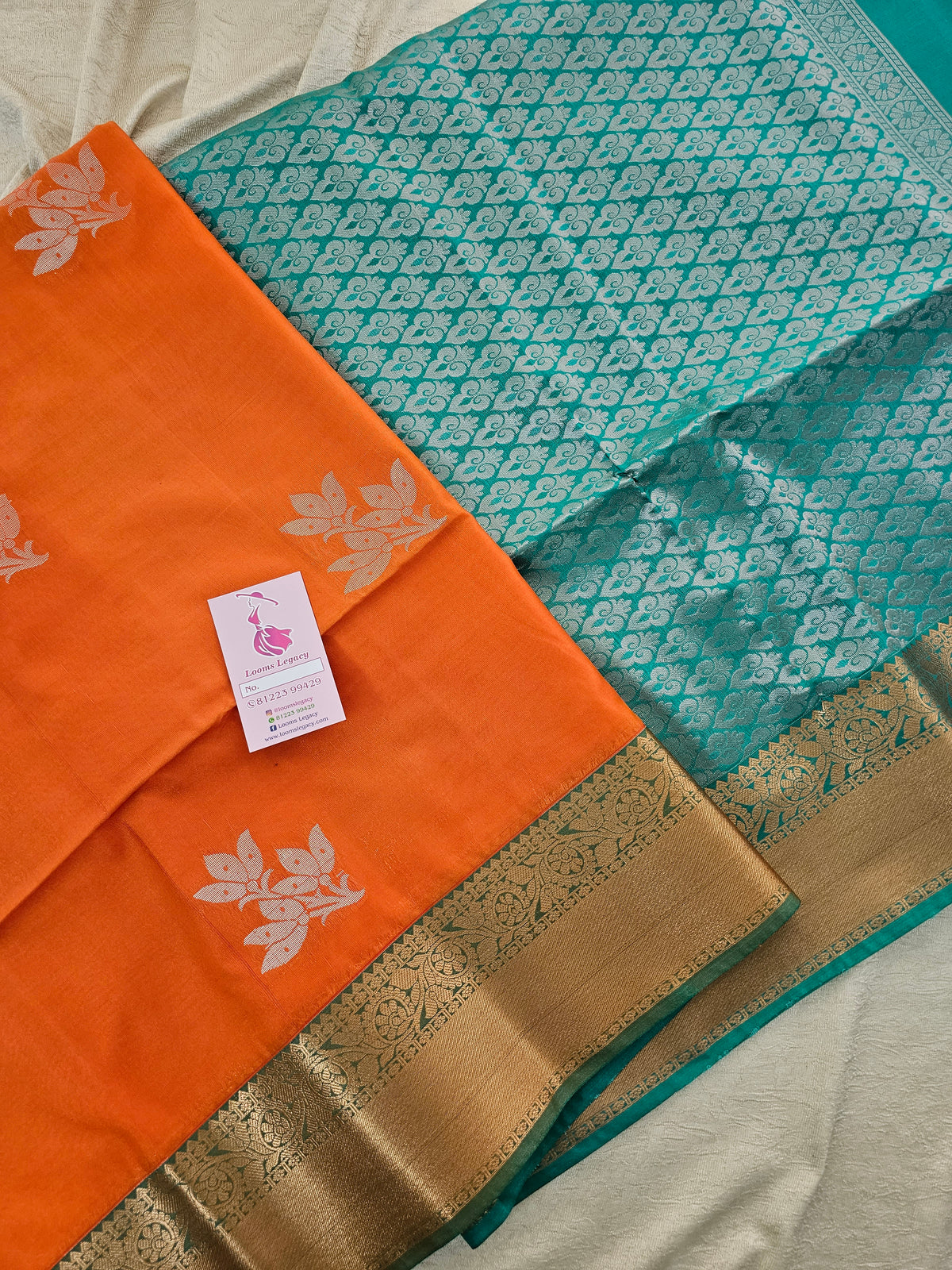 Orange with Sea Green Copper Zari Woven Border Semi Soft Silk Saree