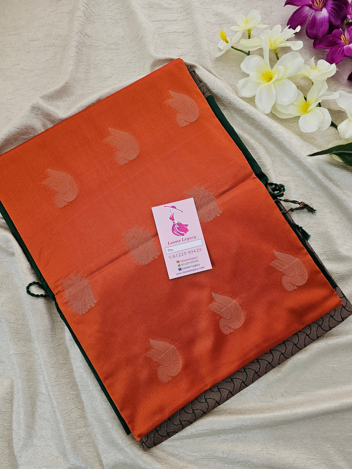 Dark Orange with Bottle Green Copper Zari Woven Semi Soft Silk Saree