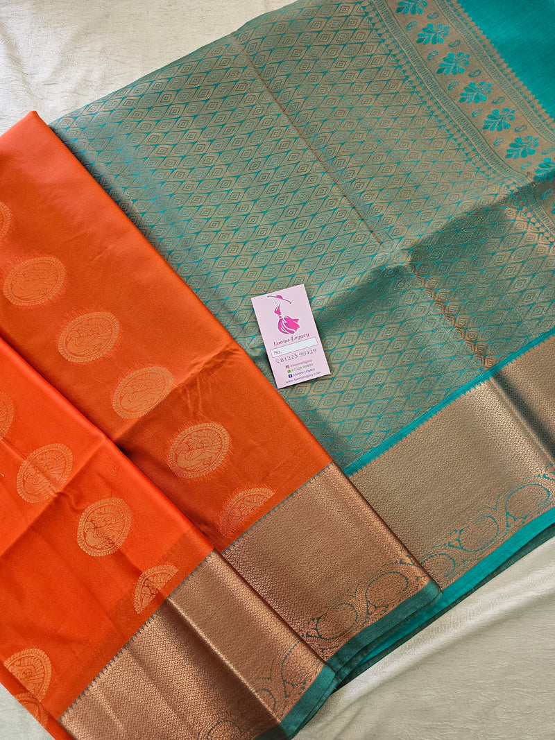 Orange with Sea Green Copper Zari Woven Border Semi Soft Silk Saree