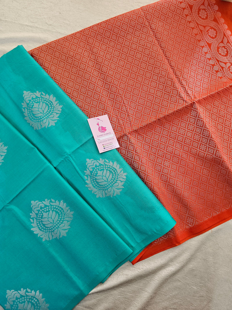 Sea Green with Orange Silver Zari Woven Border Semi Soft Silk Saree