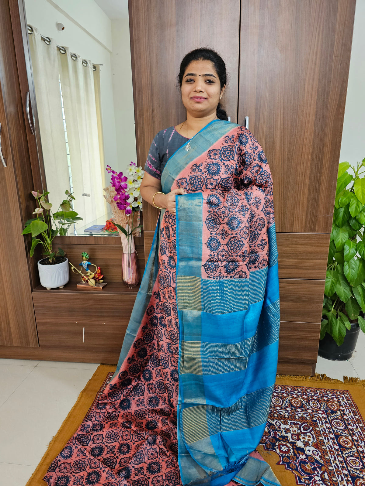 Peach with Blue Ajrak Pattern Handwoven Tussar Silk Saree with Zari Border