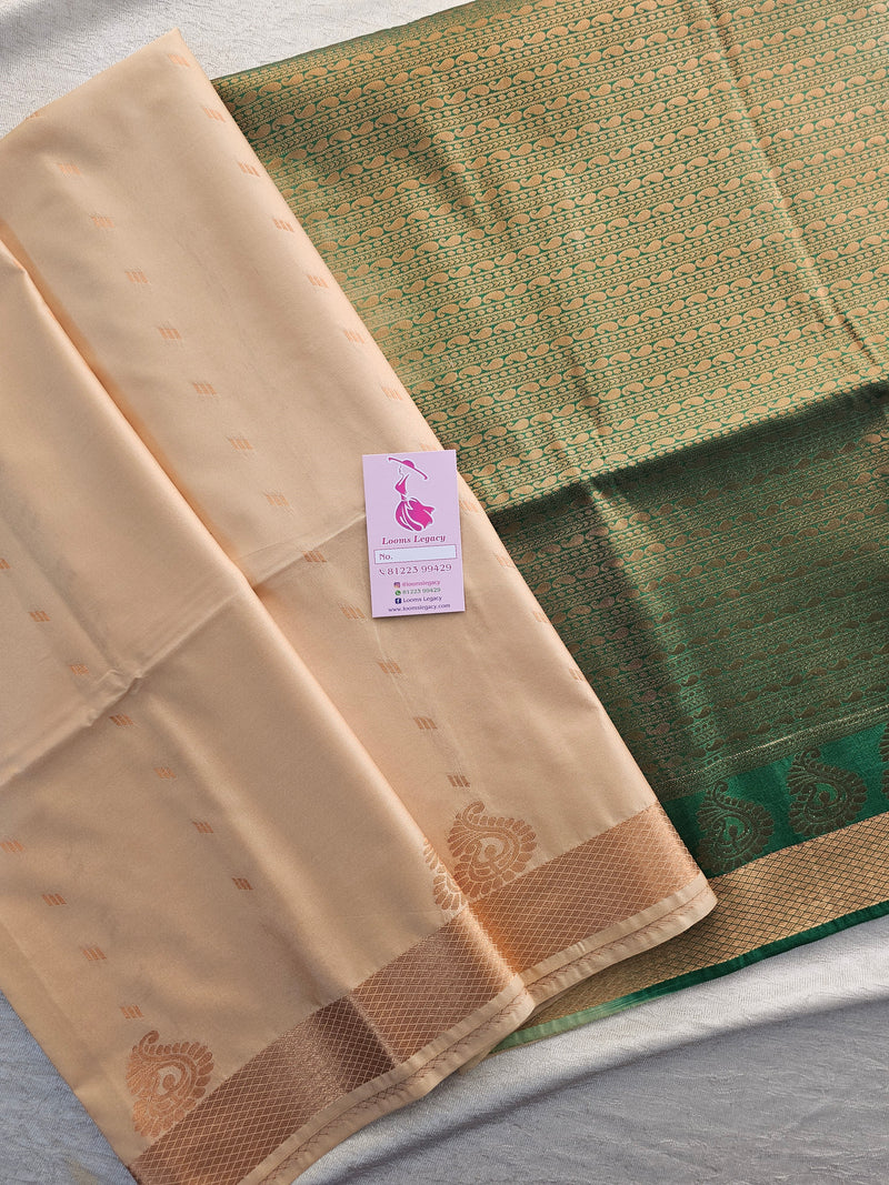 Cream with Bottle Green Copper Zari Woven Border Semi Soft Silk Saree