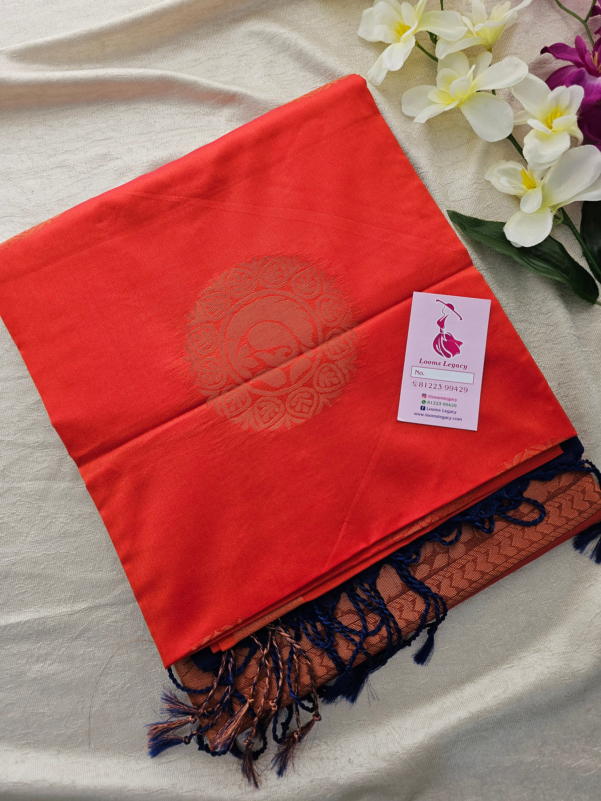 Orange with Blue Copper Zari Woven Border Semi Soft Silk Saree