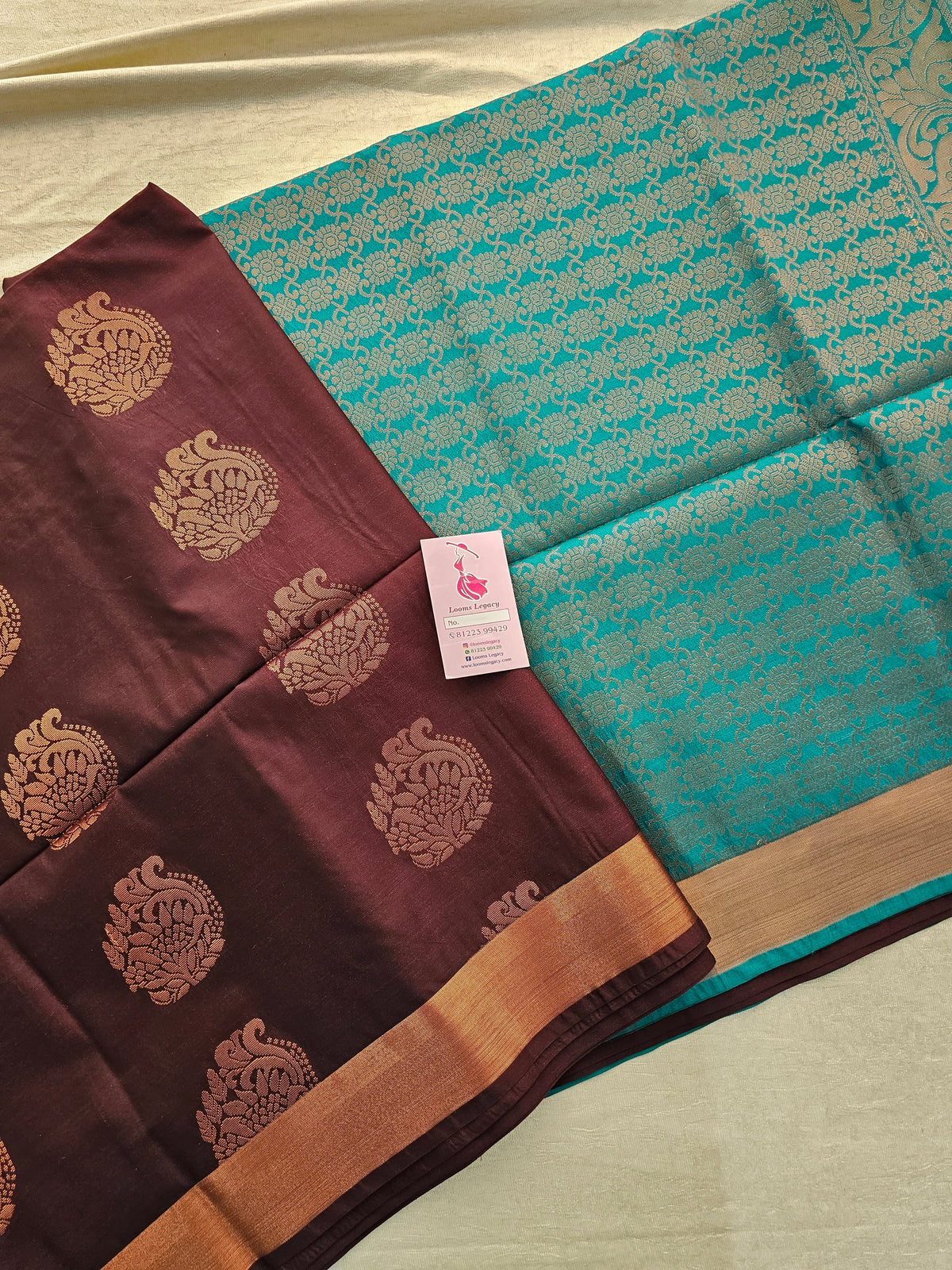 Brown with Sea Green Copper Zari Woven Border Semi Soft Silk Saree