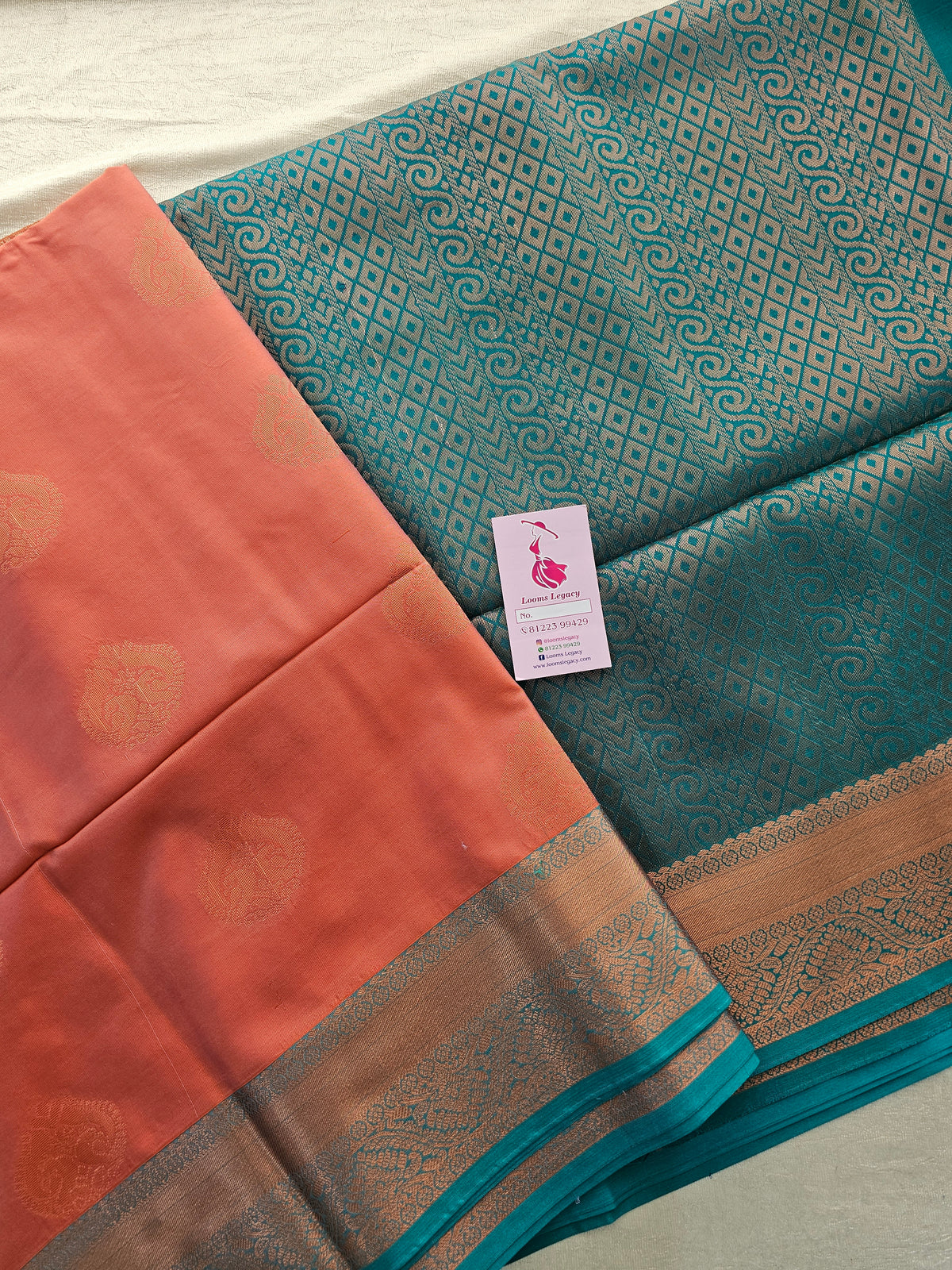 Dark Peach with Sea Green Copper Zari Woven Border Semi Soft Silk Saree