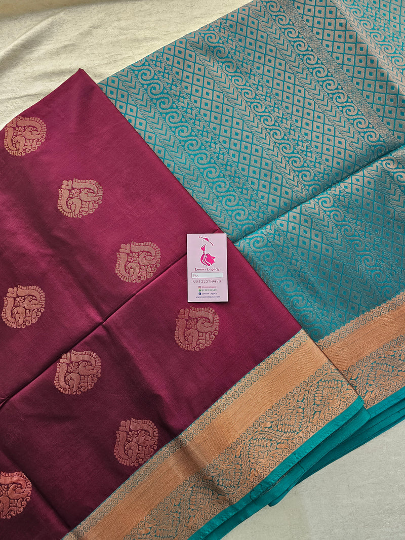 Brown with Sea Green Copper Zari Woven Border Semi Soft Silk Saree