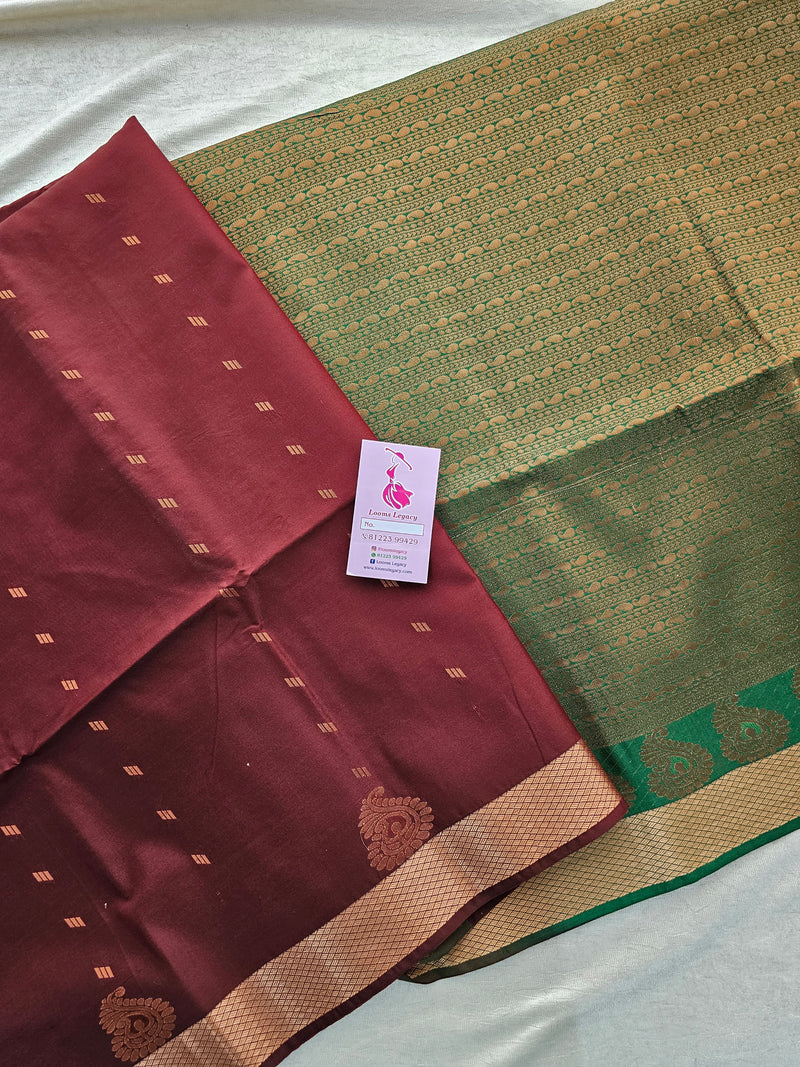 Brown with Bottle Green Copper Zari Woven Border Semi Soft Silk Saree