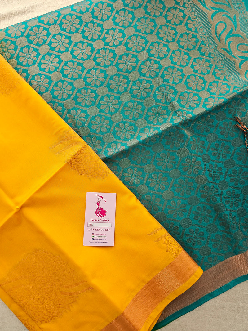 Yellow with Sea Green Copper Zari Woven Border Semi Soft Silk Saree