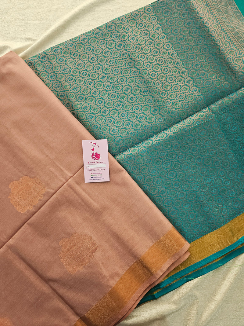 Onion Pink with Peacock Green Copper Zari Woven Border Semi Soft Silk Saree