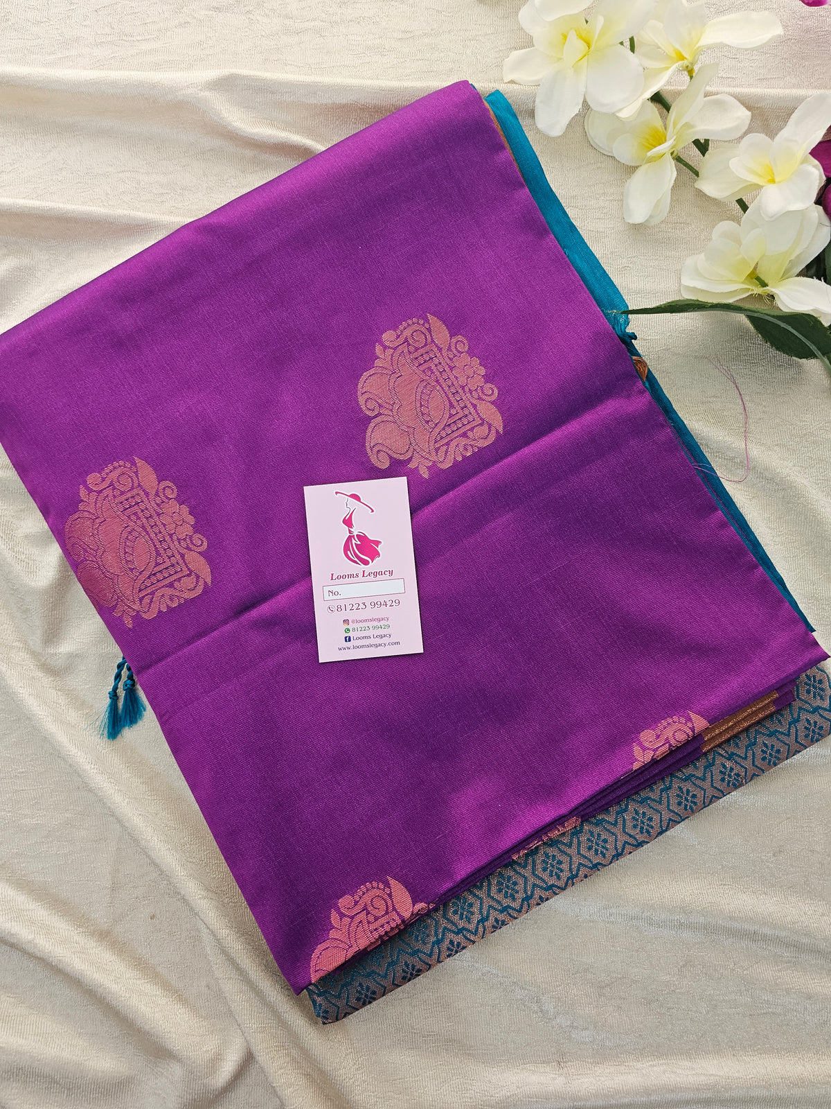 Purple with Peacock Blue Copper Zari Woven Border Semi Soft Silk Saree