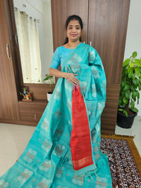 Semi Maandu Tussar Zari Weaving Saree - Sea Green with Red Blouse