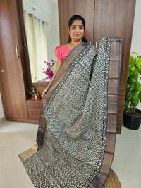 Offwhite with Black Handwoven Tussar Silk Saree with Zari Border