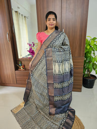 Offwhite with Black Handwoven Tussar Silk Saree with Zari Border