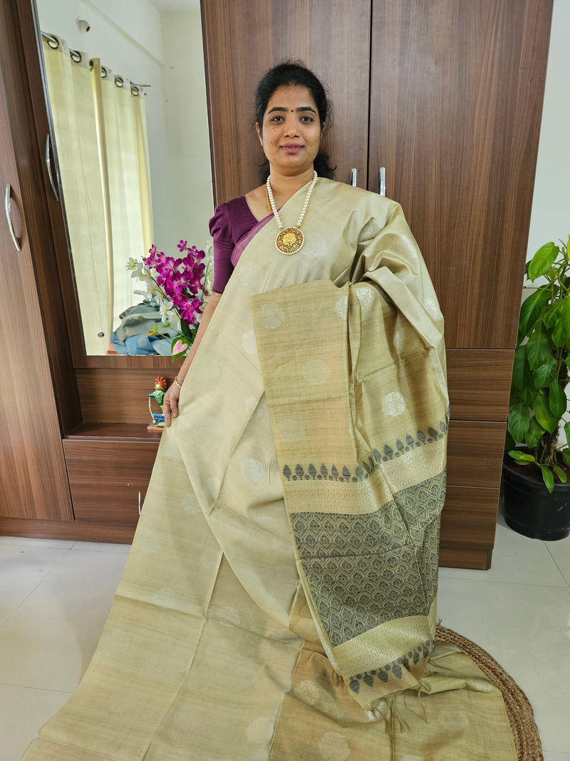 Semi Maandu Tussar Silver Zari Weaving Half and Half Shade Saree - Pastel Yellow