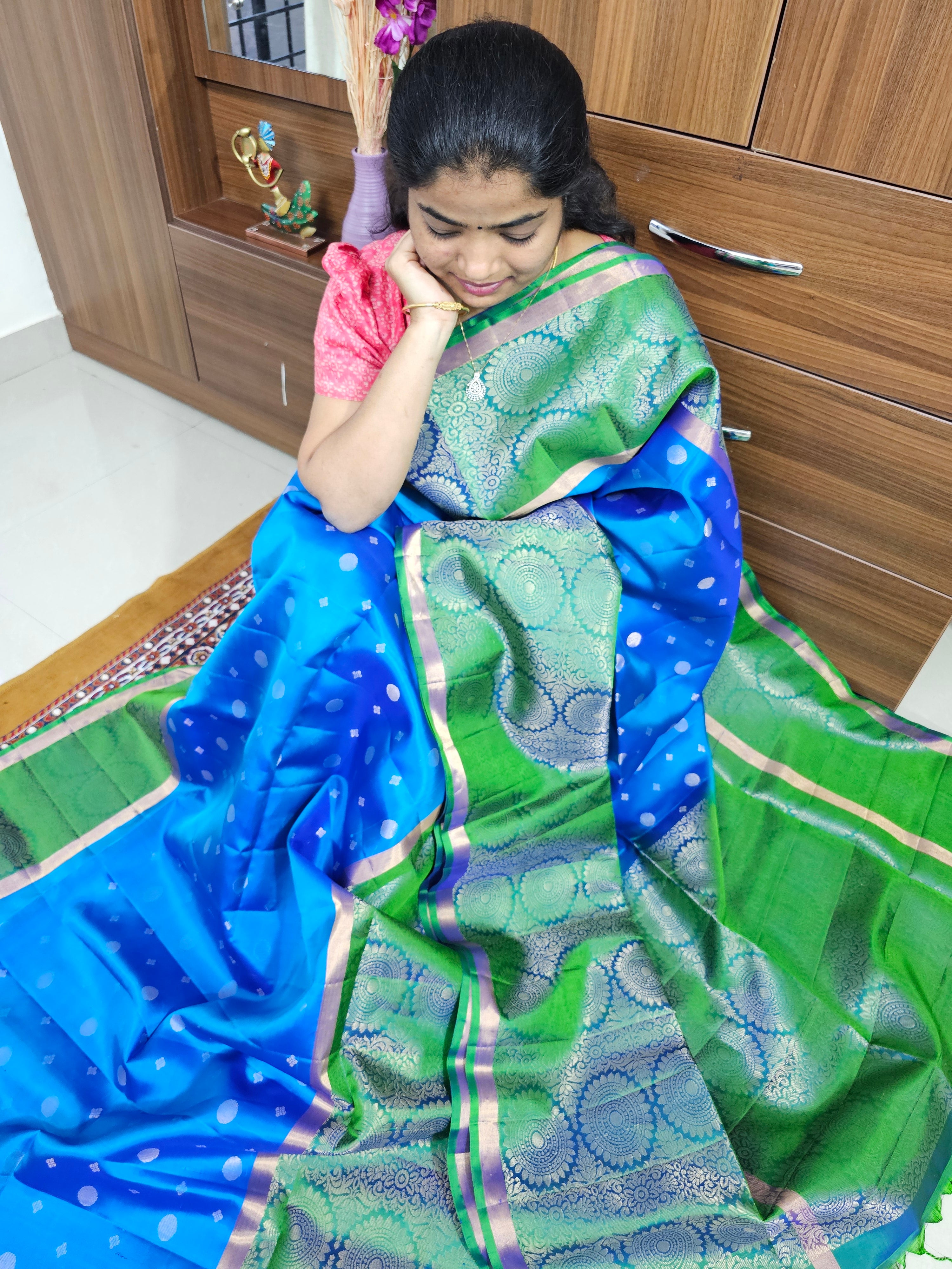 Tissue Kuppadam Gold Butti Mehandi Green And Copper Sulphate Blue Saree