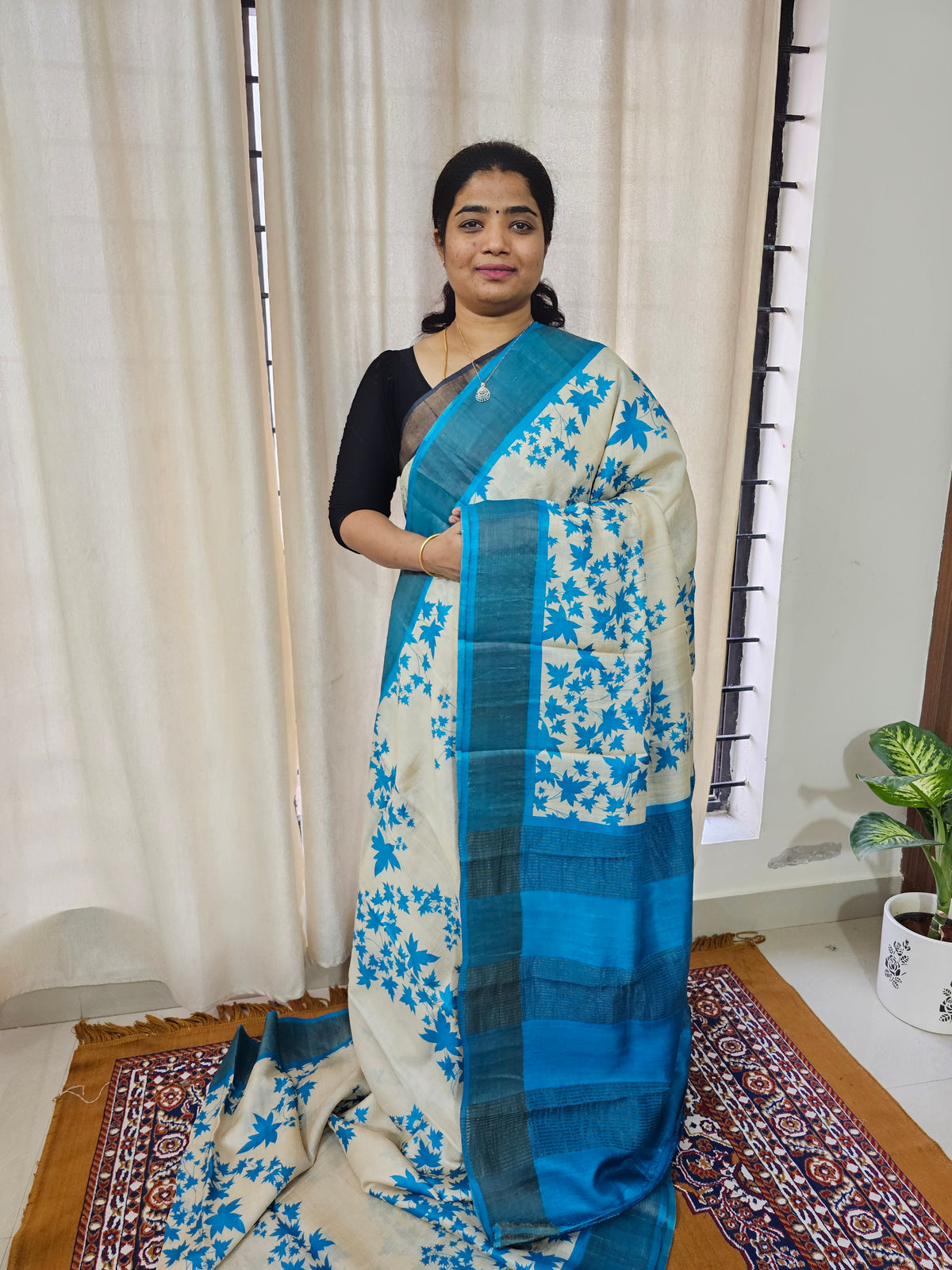 Off-white with Blue Handwoven Tussar Silk Saree with Zari Border