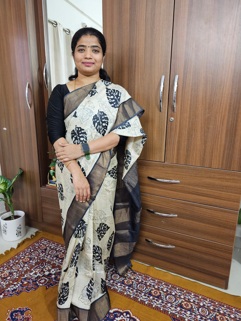 Black and White Handwoven Tussar Silk Saree with Zari Border