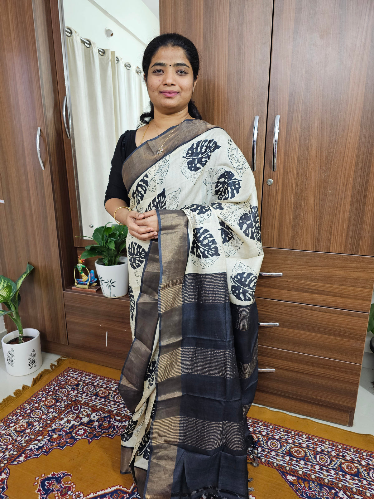 Black and White Handwoven Tussar Silk Saree with Zari Border