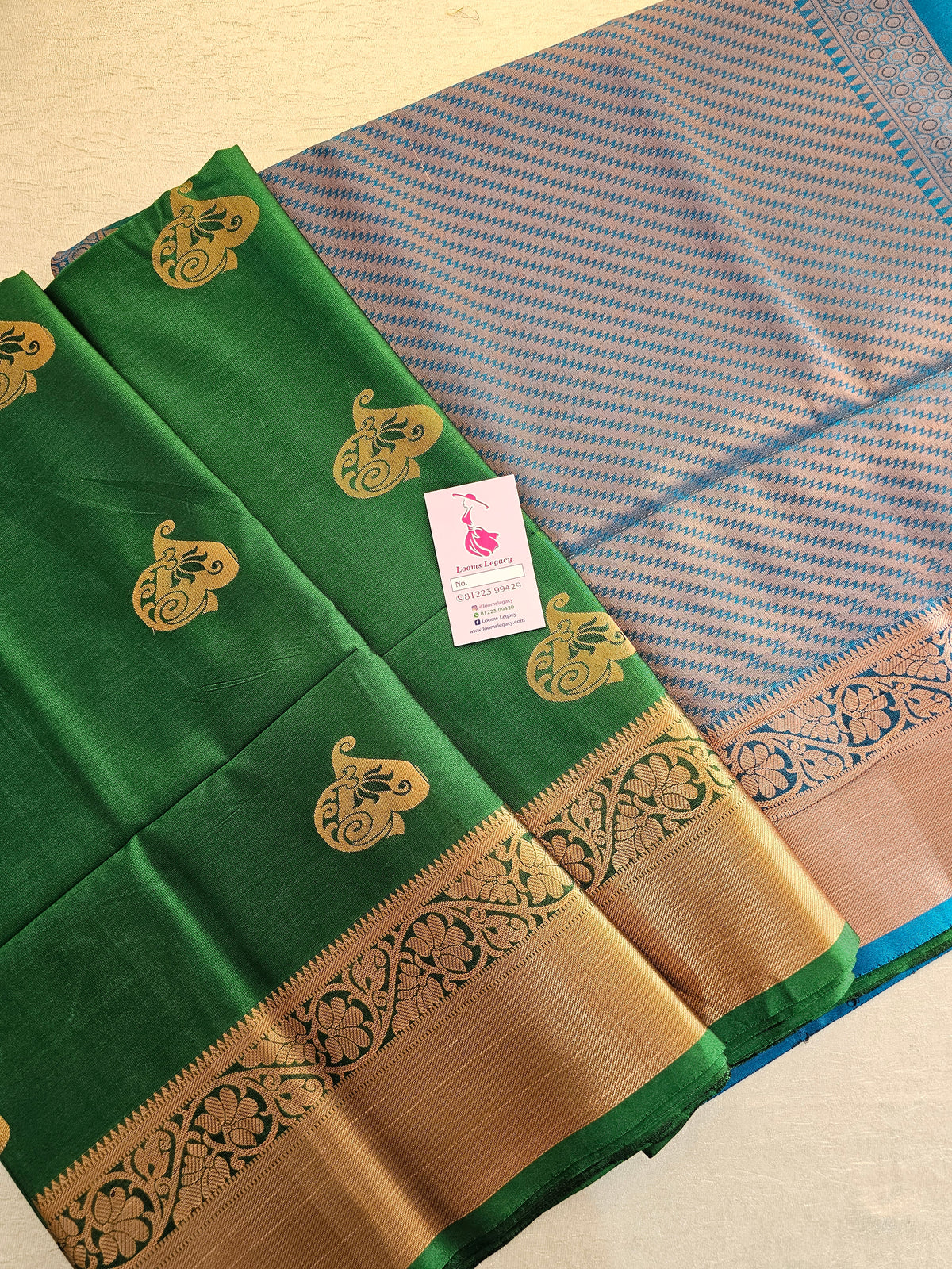 Bottle Green with Blue Copper Zari Woven Border Semi Soft Silk Saree