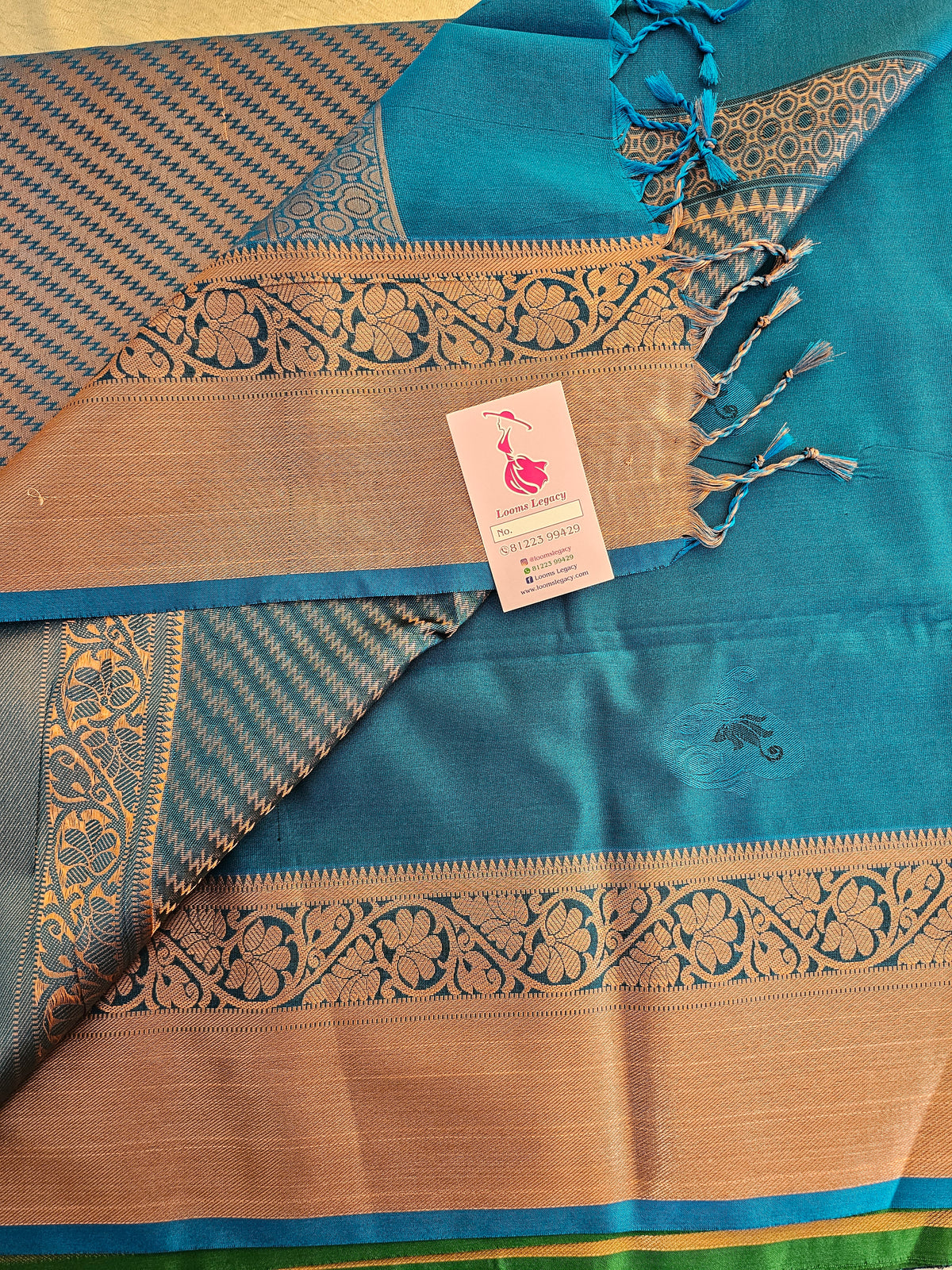 Bottle Green with Blue Copper Zari Woven Border Semi Soft Silk Saree