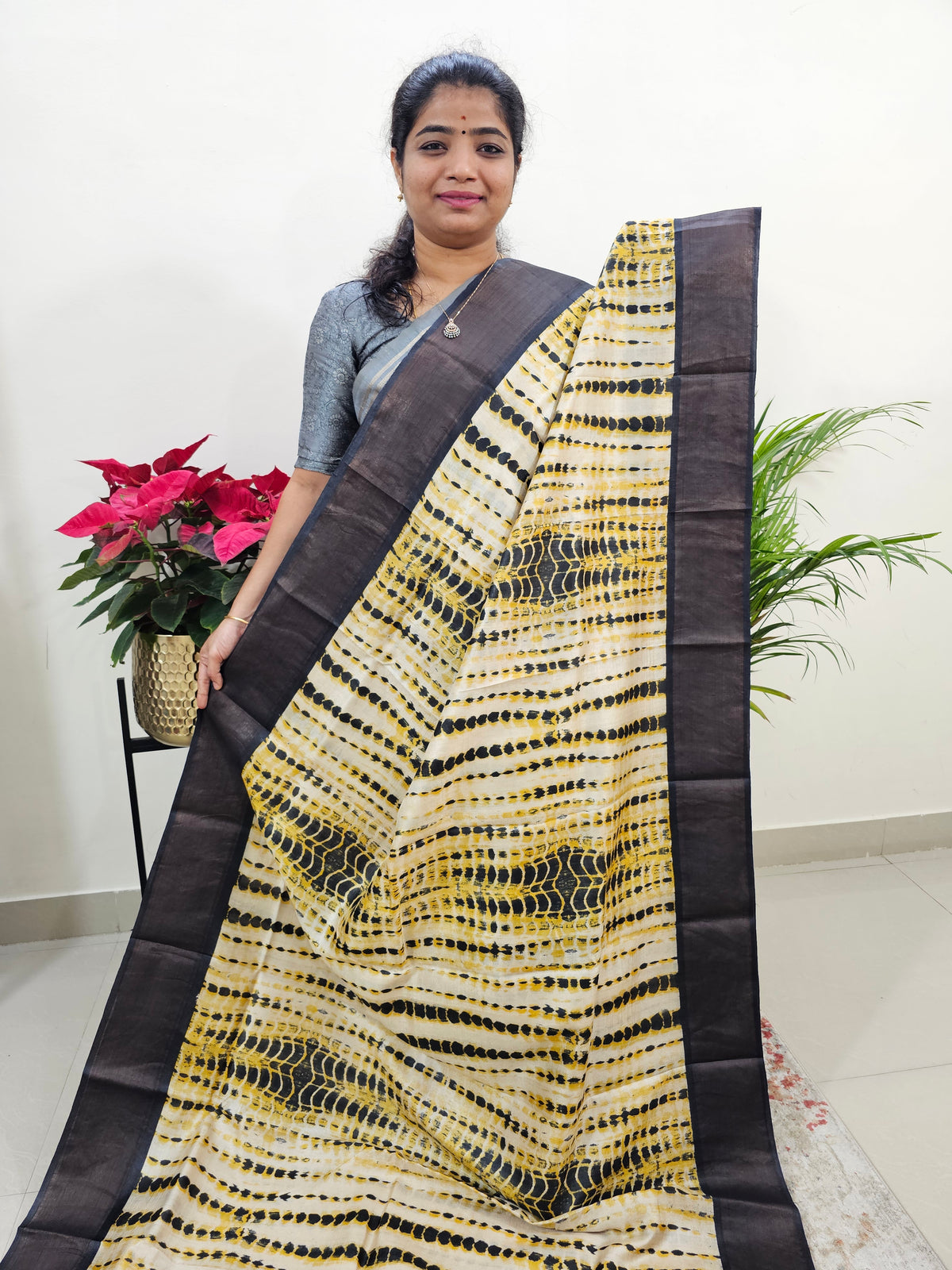 Yellow with Black Tussar Silk Saree with Zari Border