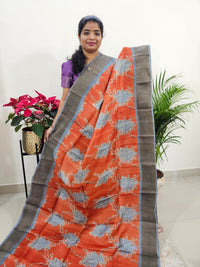 Orange with Grey Tussar Silk Saree with Zari Border