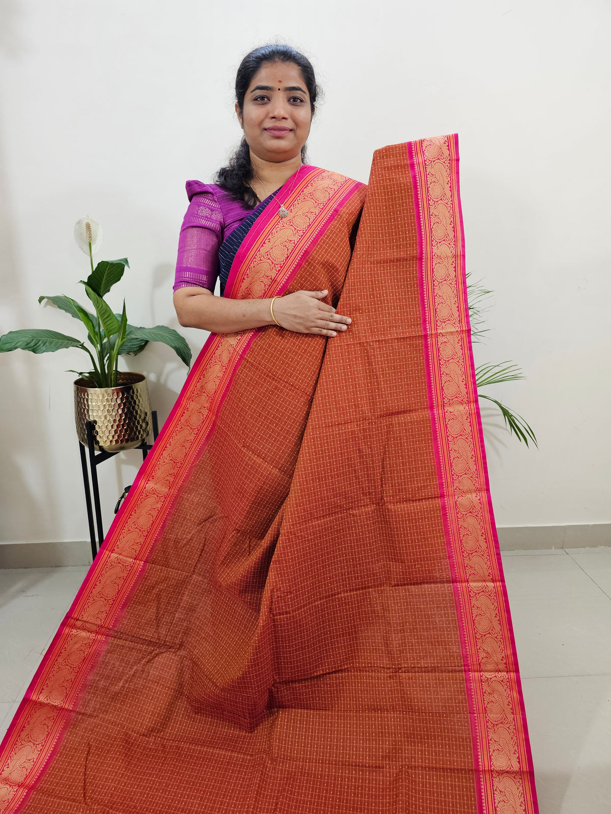 Rust Orange with Pink Lakshadeepam Pattern Kanchi Cotton Sarees