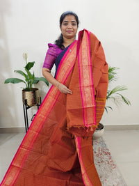 Rust Orange with Pink Lakshadeepam Pattern Kanchi Cotton Sarees