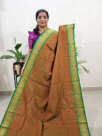 Dual Shade Brown cum Yellow with Green Lakshadeepam Pattern Kanchi Cotton Sarees