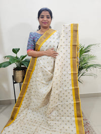 Off-white with Yellow Tussar Silk Saree with Kanchi Border