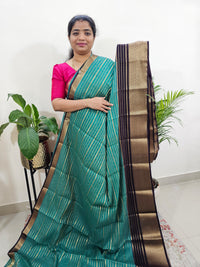 Semi Tussar Georgette with Zari Woven Saree Border - Sea Green with Maroon