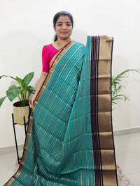 Semi Tussar Georgette with Zari Woven Saree Border - Sea Green with Brown