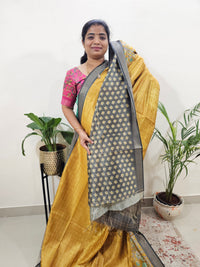 Soft Semi Tussar Weaving with Pichwai Border - Yellow with Grey