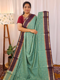Georgette with Zari Woven Border Saree - Sea Green with Purple