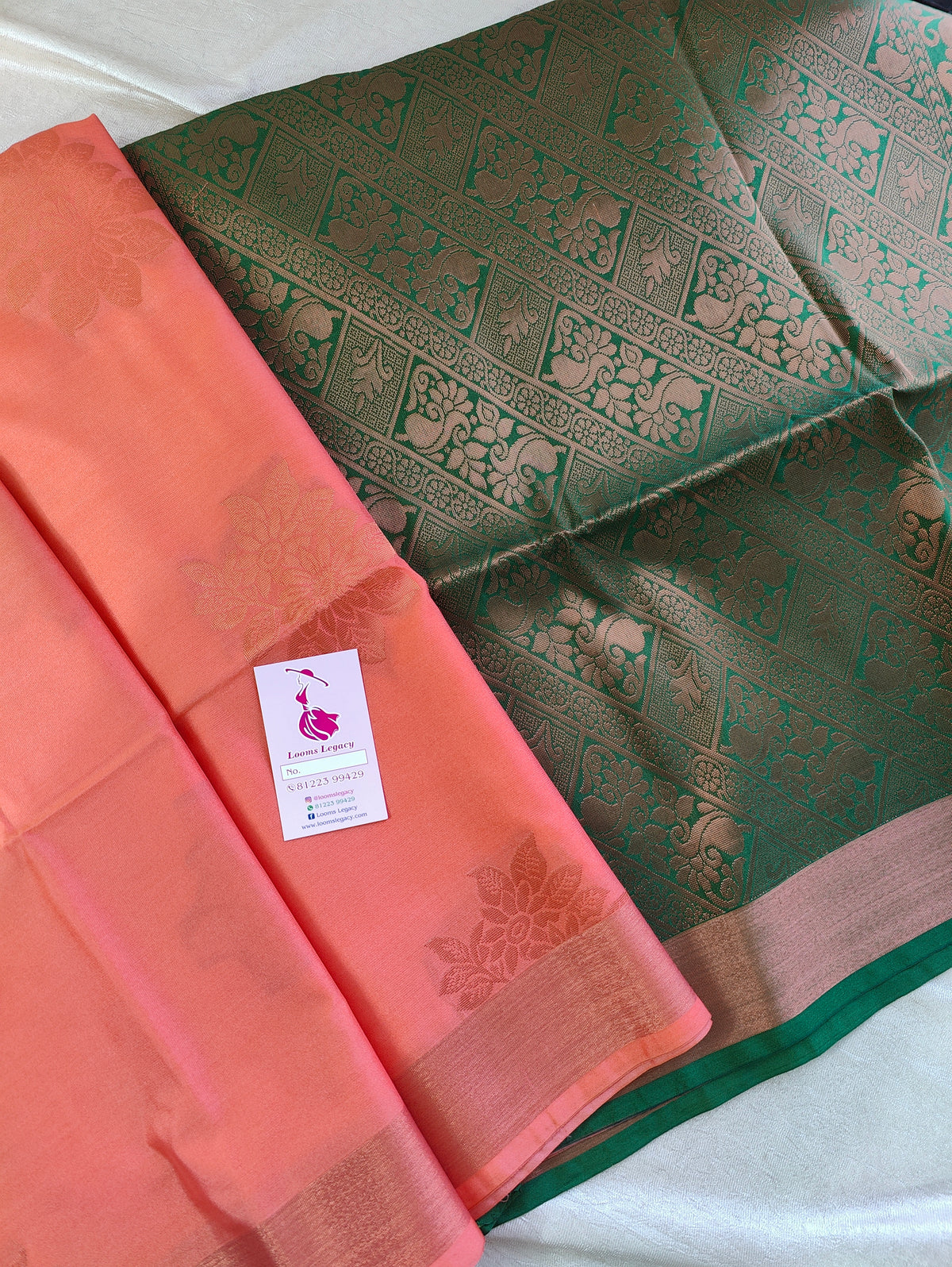 Peach with Bottle Green Copper Zari Woven Border Semi Soft Silk Saree