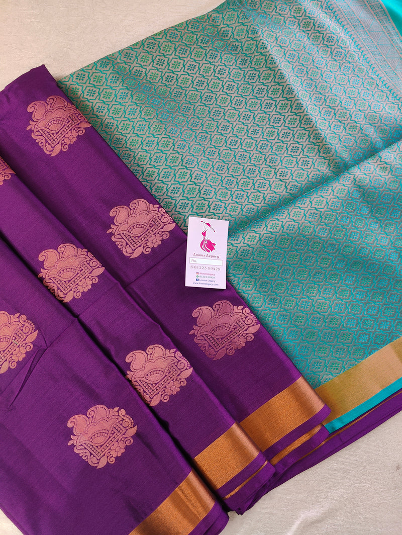 Dark Purple with Dual Shade Sea Green cum Blue Copper Zari Woven Border Semi Soft Silk Saree