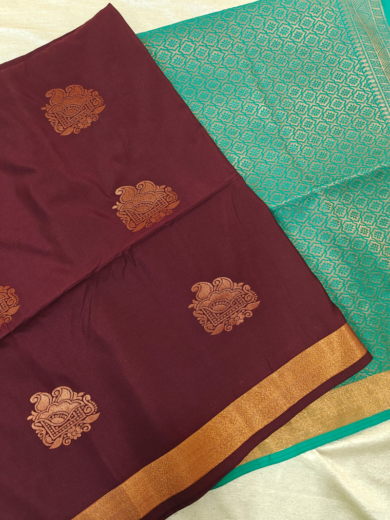 Brown with Sea Green Copper Zari Woven Border Semi Soft Silk Saree